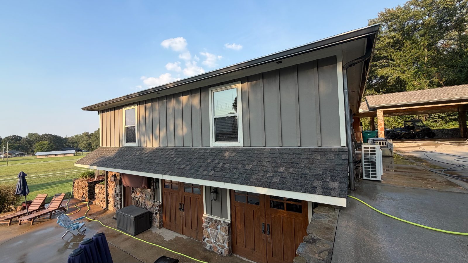 Washed roof and siding on a two-story home